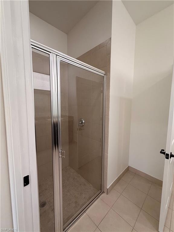 Enclosed shower with clear glass door and brushed nickel hardware