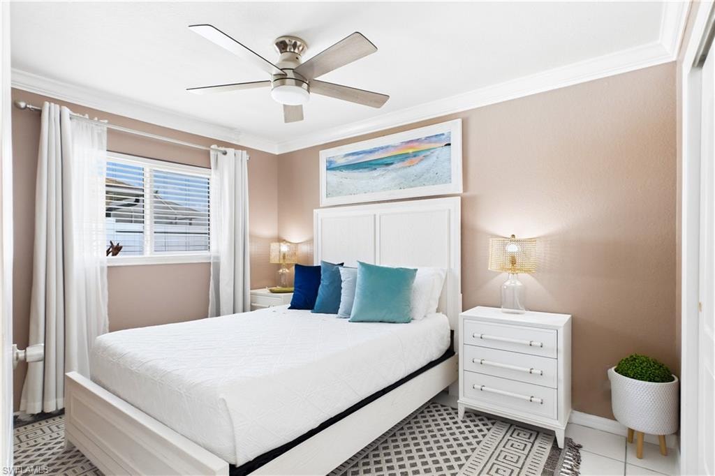Bedroom with crown molding.