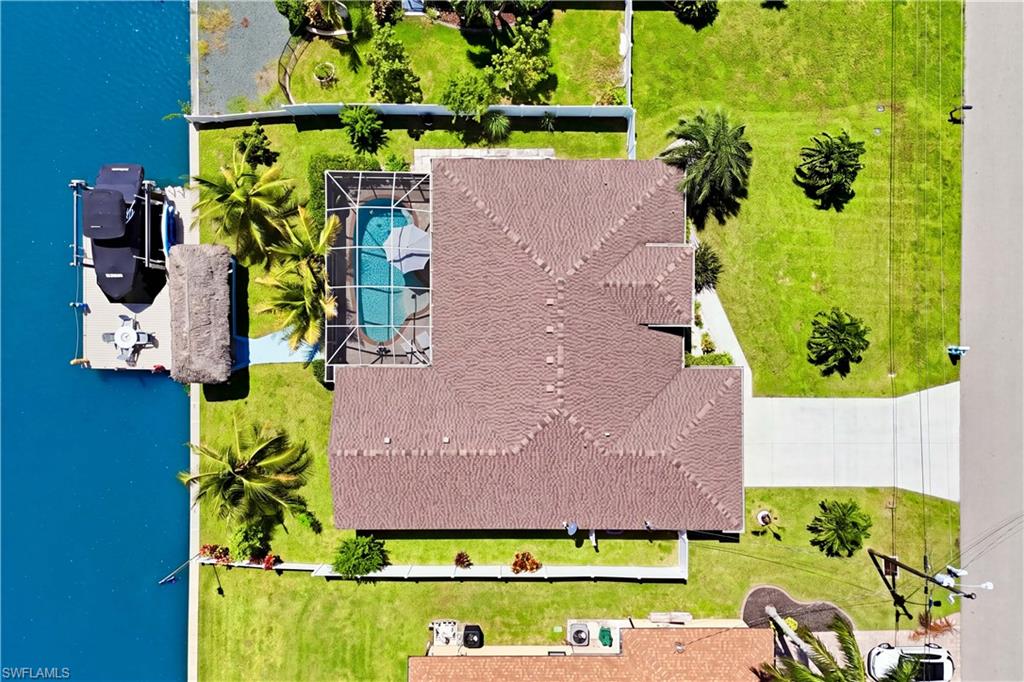 Birds eye view of a Cape Coral waterfront oasis.