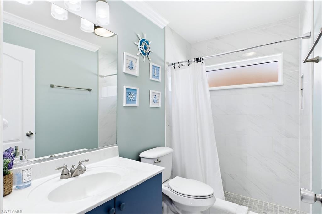 Guest bathroom with step in shower.