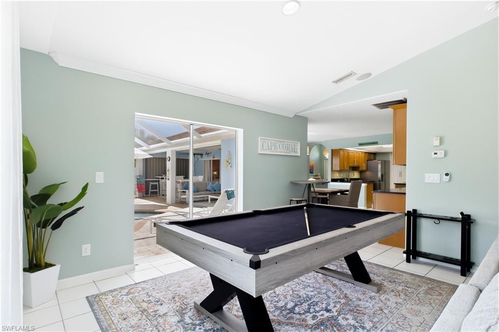 Fun family room opens to the Lania for more entertaining space.