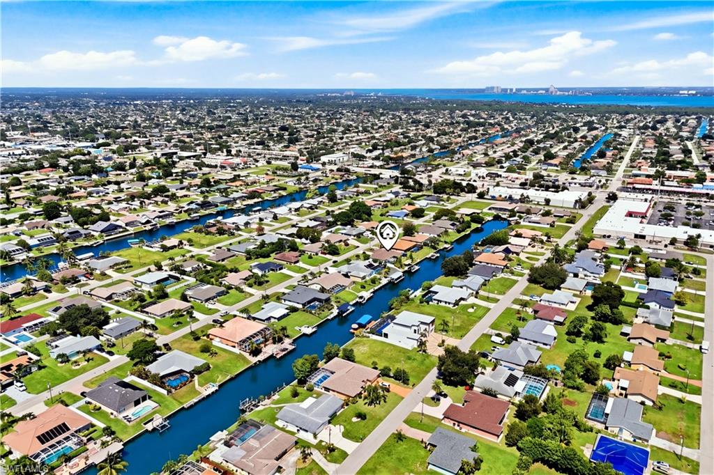 Beautiful waterfront Cape Coral home and distant river view.
