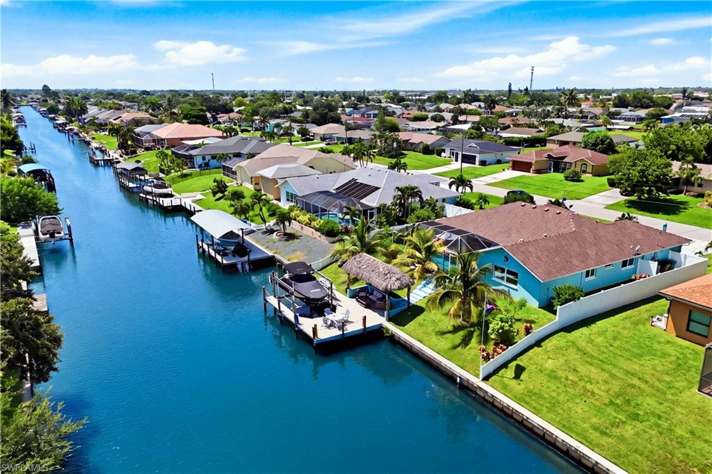 Waterfront property with private boat dock and Tiki Hut