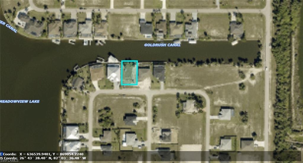 Aerial Property Survey. Depicting the layout and positioning of the property relative to surrounding parcels, water bodies, and infrastructure