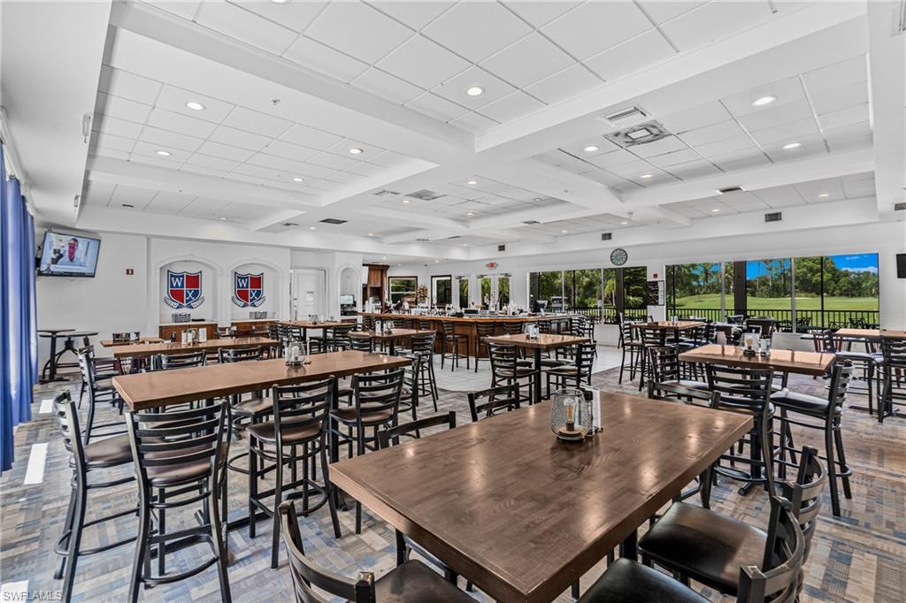 Spacious interior with high ceilings and recessed lighting