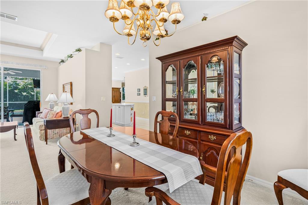 Tray ceiling and large sliding glass doors in the living area