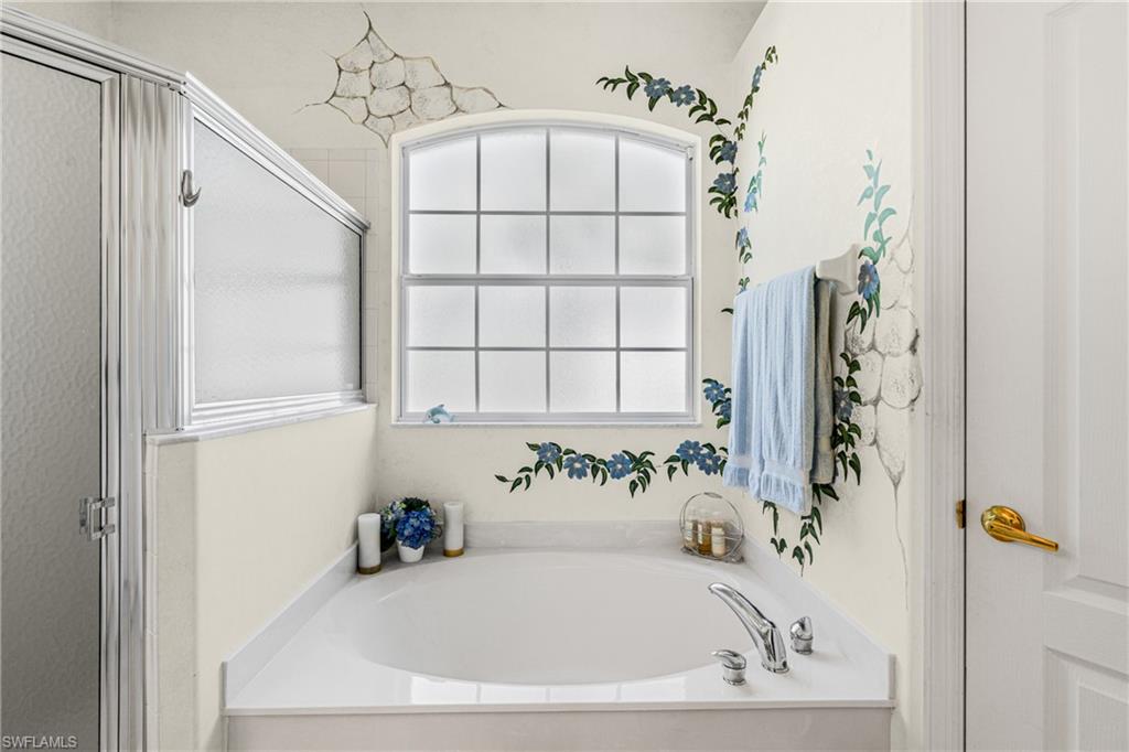 Alcove bathtub with deck-mounted faucet