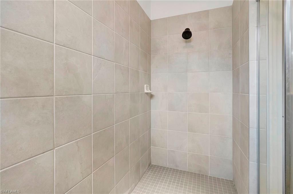 Bathroom with tiled shower