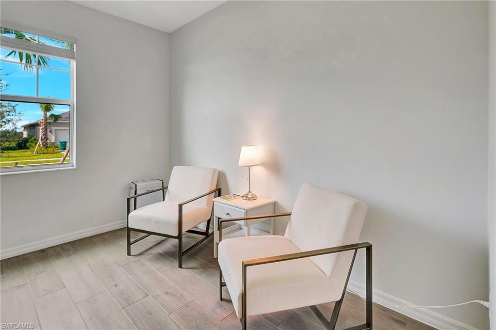 Sitting room featuring light wood-type flooring