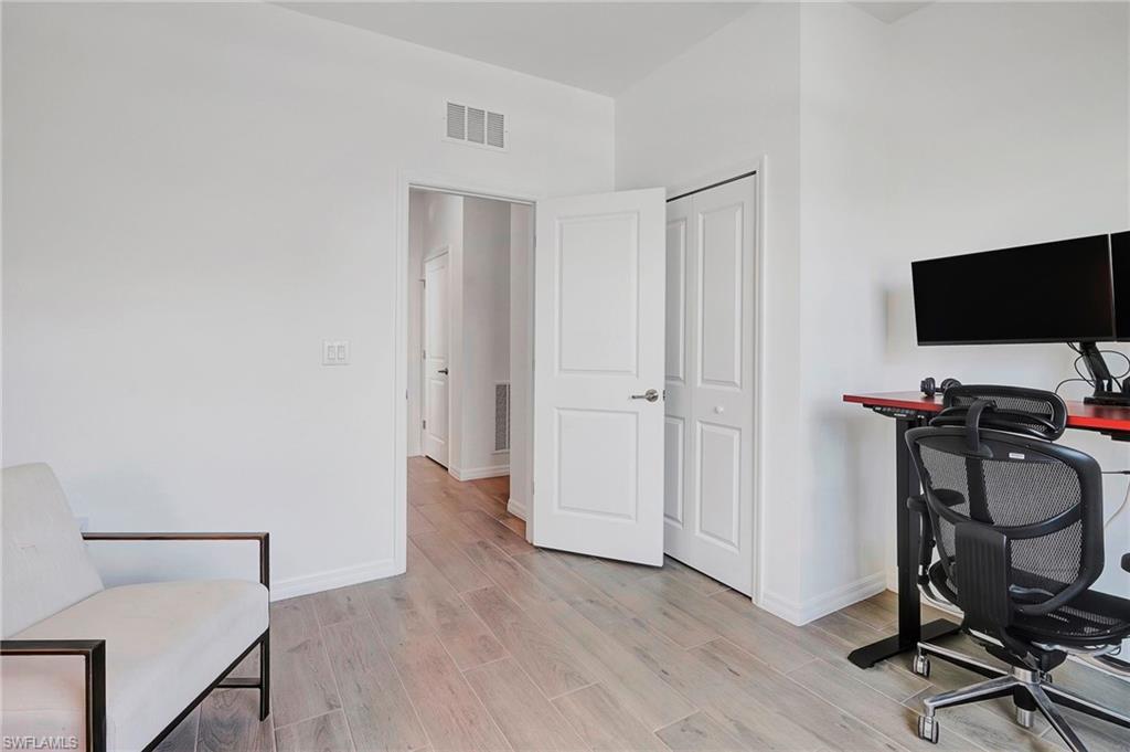 Office featuring light hardwood / wood-style floors