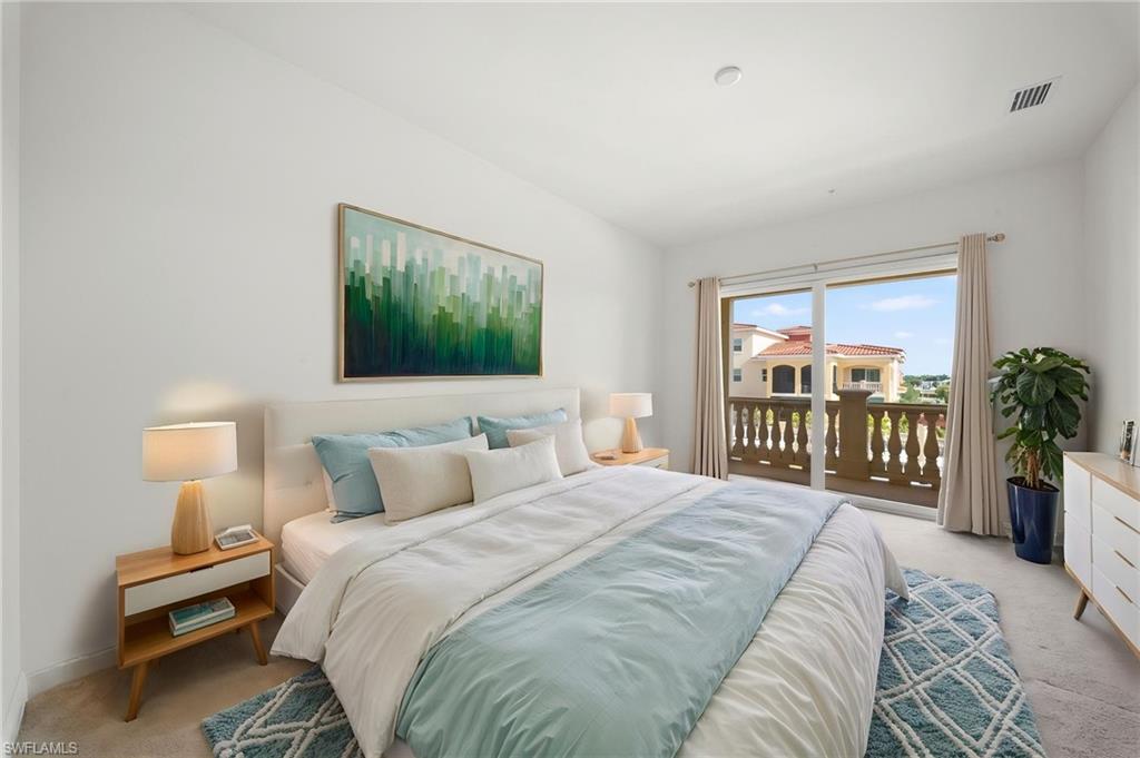 Main bedroom with sliding glass door to separate outdoor lanai