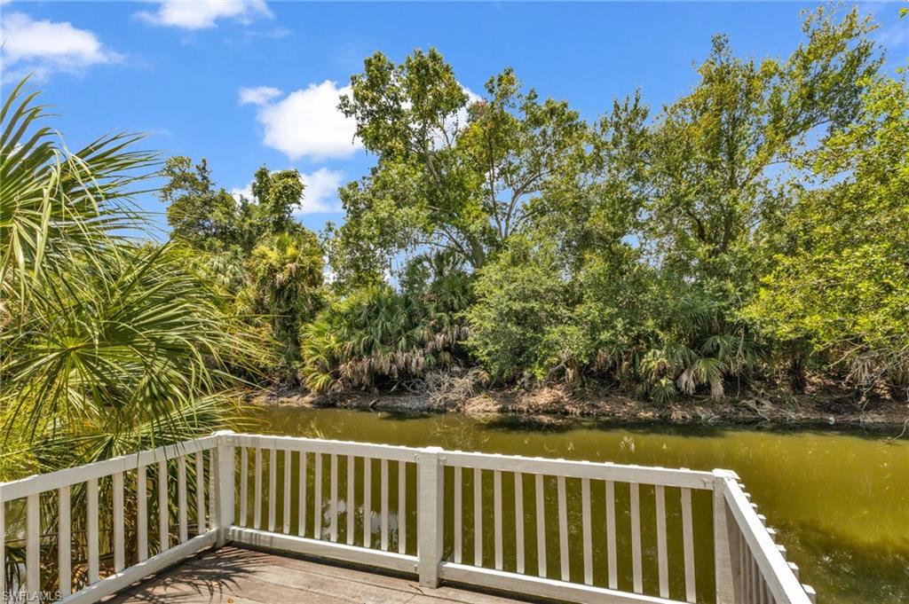 The wooden deck overlooking the freshwater canal. Made for kayaking, paddle boarding, or just sitting out and enjoying natural surroundings.