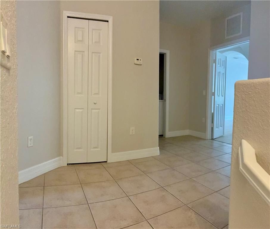 top of stairs large landing w linen closet---door to laundry and double door entry to primary bedroom