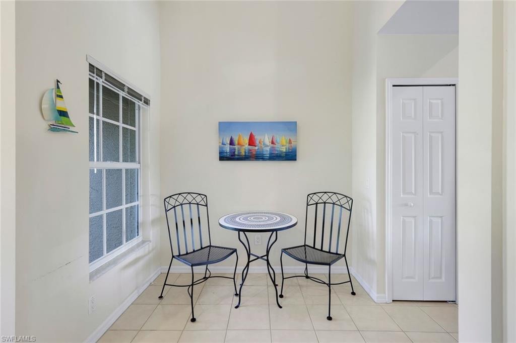 Charming Breakfast Nook with Vaulted Ceiling and Natural Light