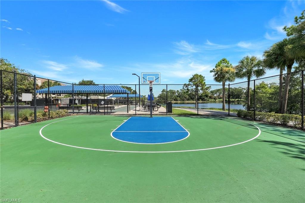 Community Basketball Court with Nearby Lake