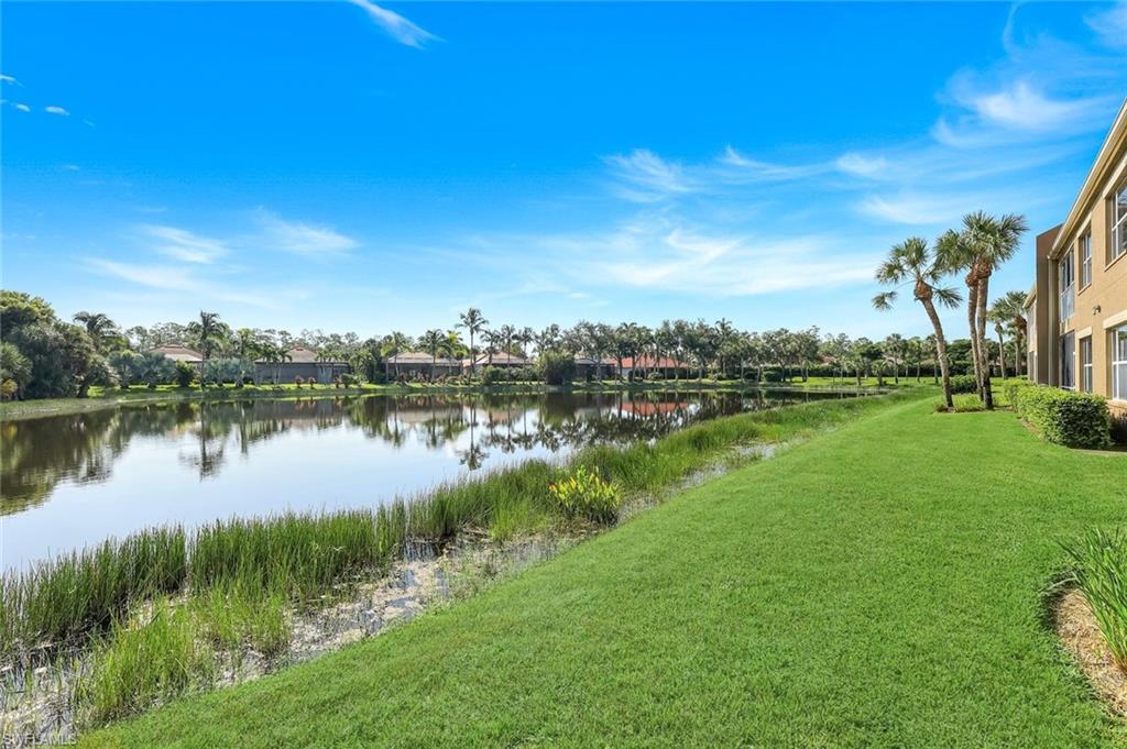 Peaceful Lake View with Lush, Manicured Landscaping