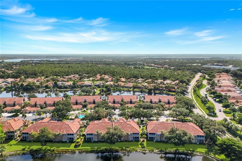 Aerial View of Sabal Palm Featuring Scenic Lakes, Tropical Landscaping, and Sabal Palm Community Pool