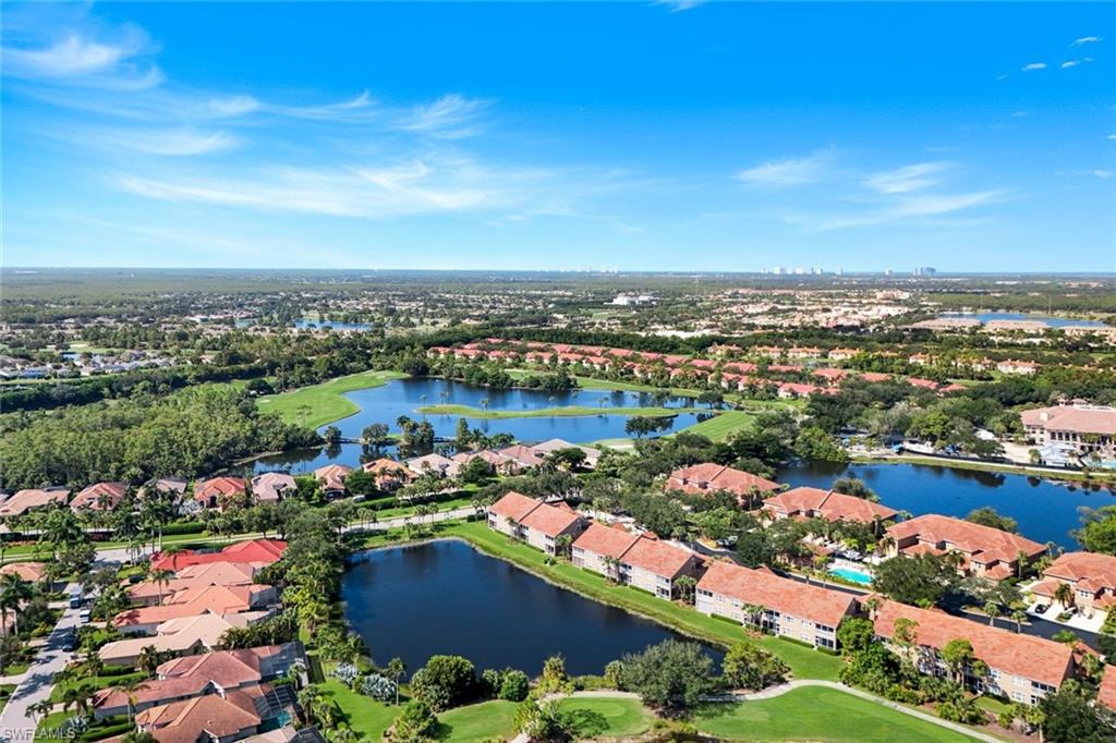 Expansive Grandezza Aerial View Featuring Golf, Lakes, and Lush Landscaping