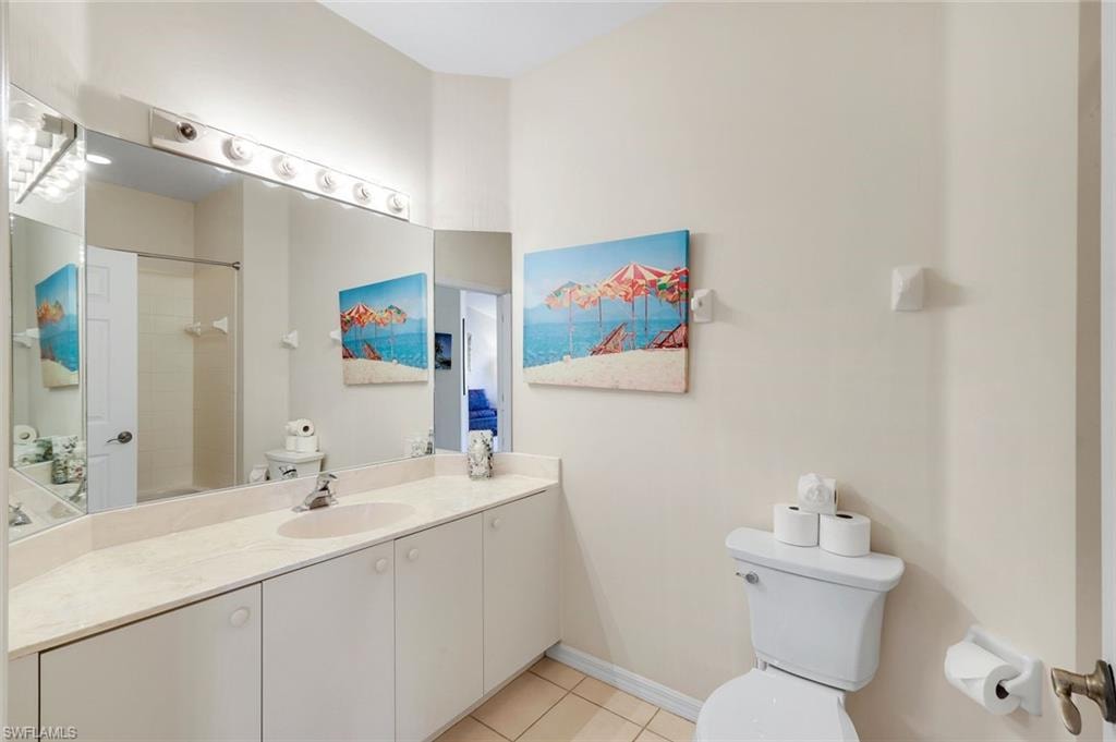 Bright Bathroom with an Extended Vanity and Tub-and-Shower Combination