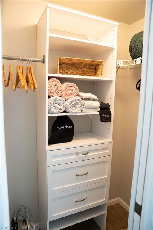 PRIMARY BEDROOM WALK IN CLOSET.