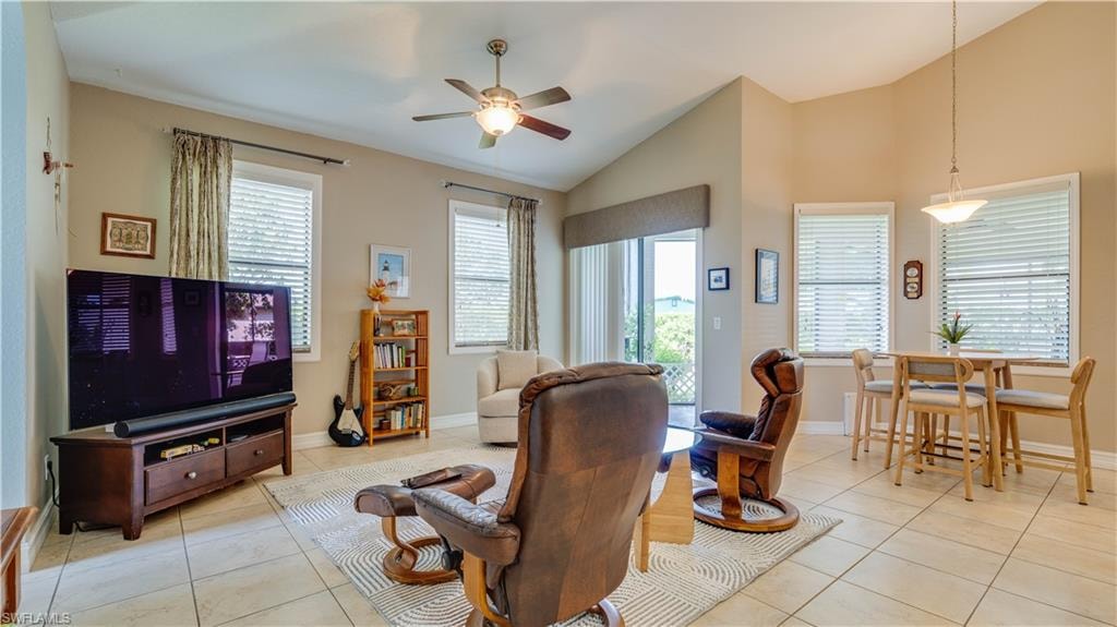 Family room & breakfast nook area with sliders to lanai & lots of windows!