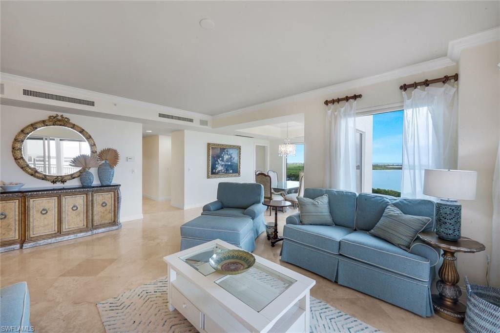 The decor of the living room provides a relaxing coastal vibe.