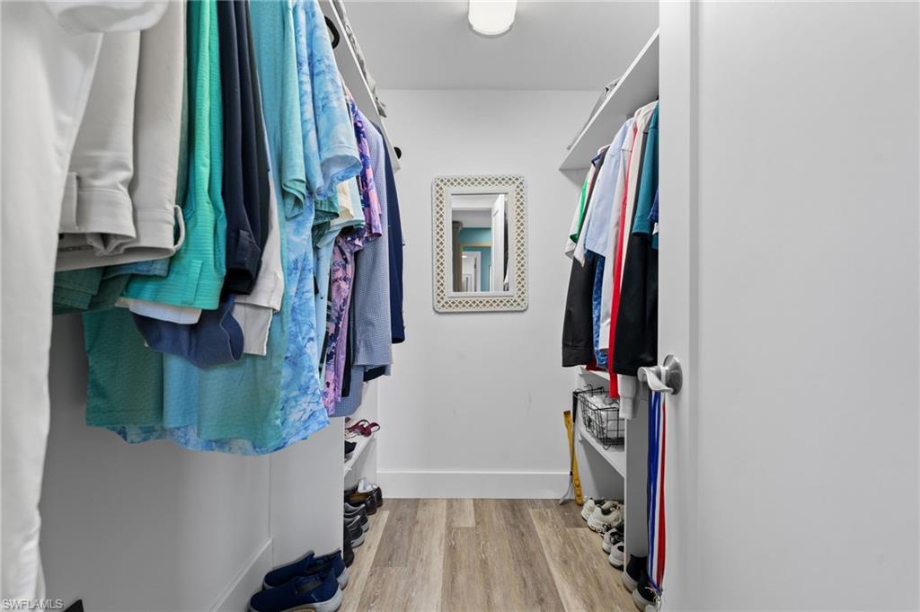 Generously sized walk-in closet in the primary suite.