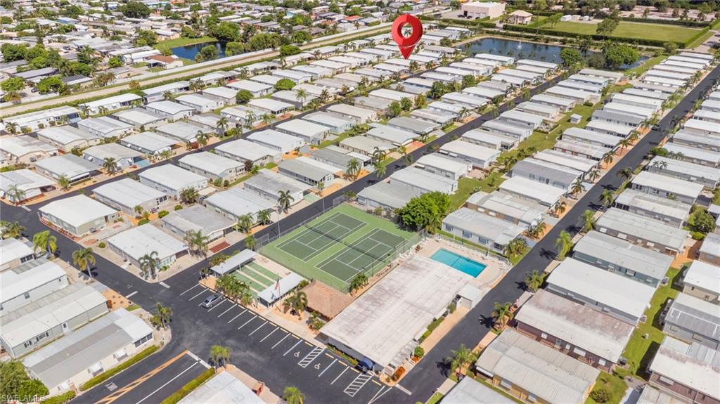 Conveniently located near the community pool and recreational courts.