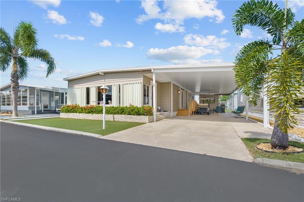 Beautifully updated home in Blue Skys, a resident-owned 55+ cooperative in central Naples.