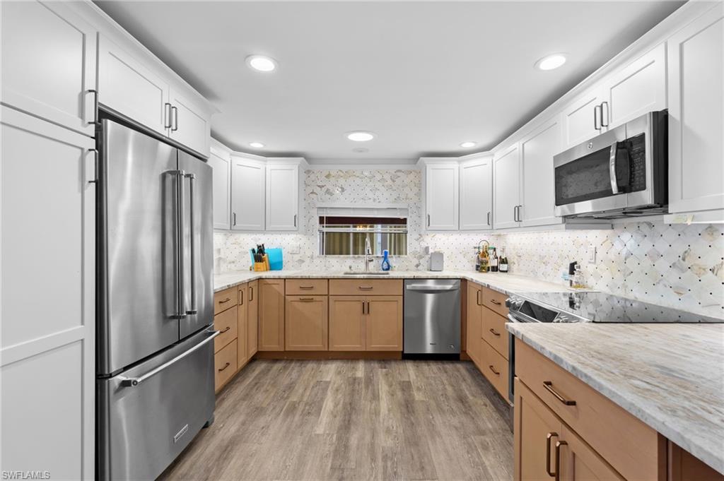 Magazine-worthy remodeled kitchen with a polished, custom-home feel.