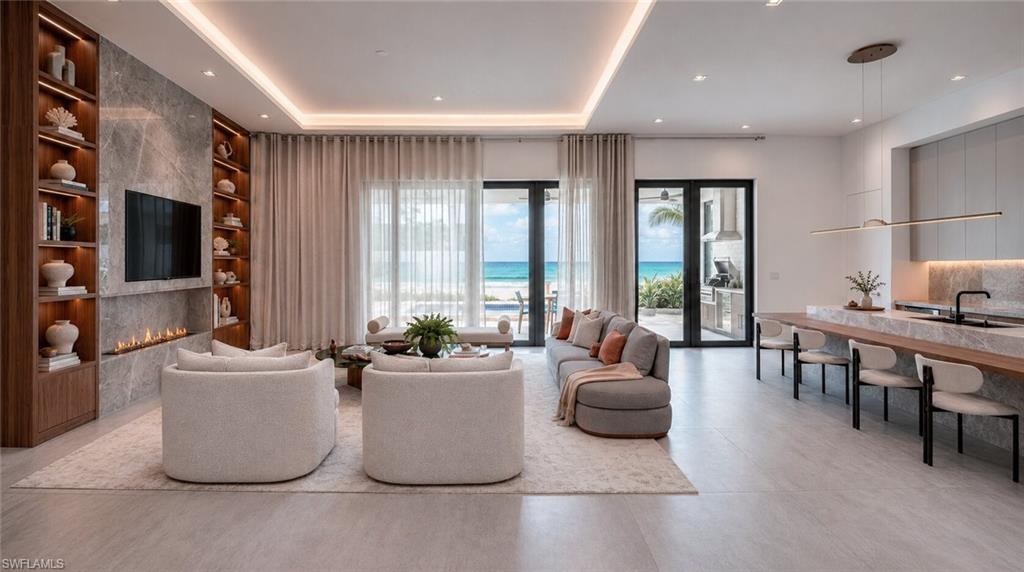 (Rendered photo) Open-concept living area with a contemporary linear fireplace, integrated shelving, and large sliding glass doors