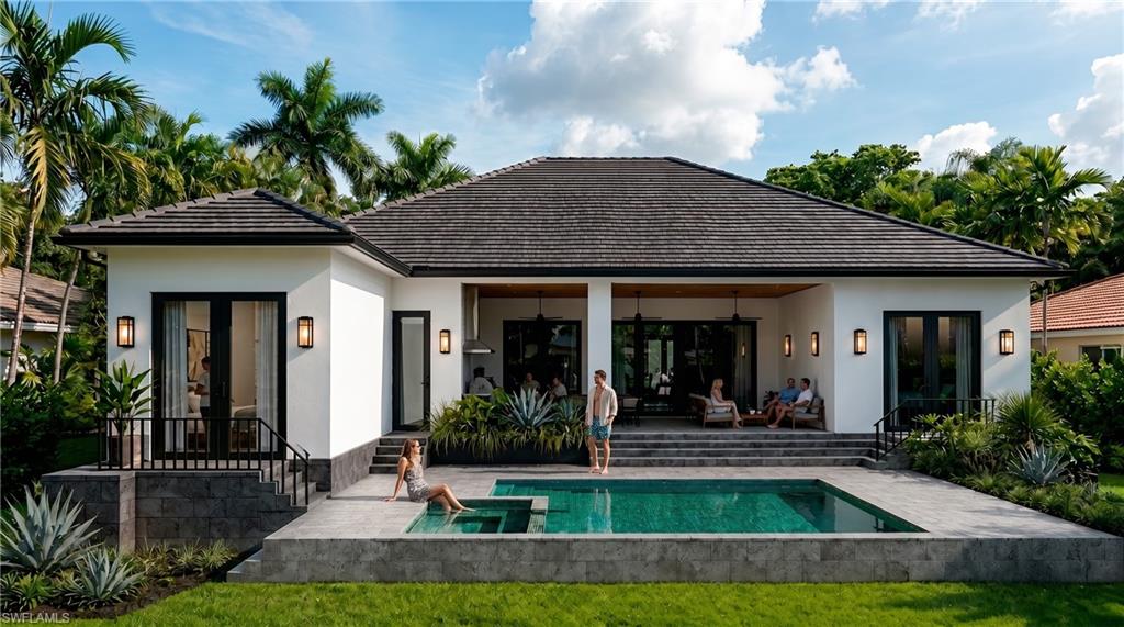 (Rendered photo) Expansive rear exterior featuring a swimming pool, integrated spa, covered patio, and stepped hardscaping
