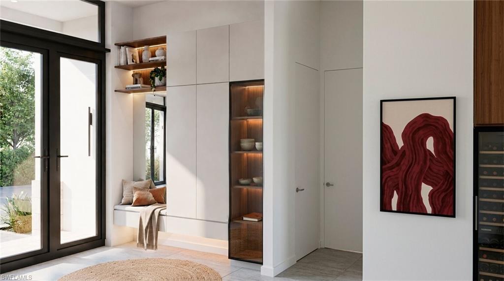(Rendered photo) Built-in shelving, integrated wine storage, and a window seat with storage