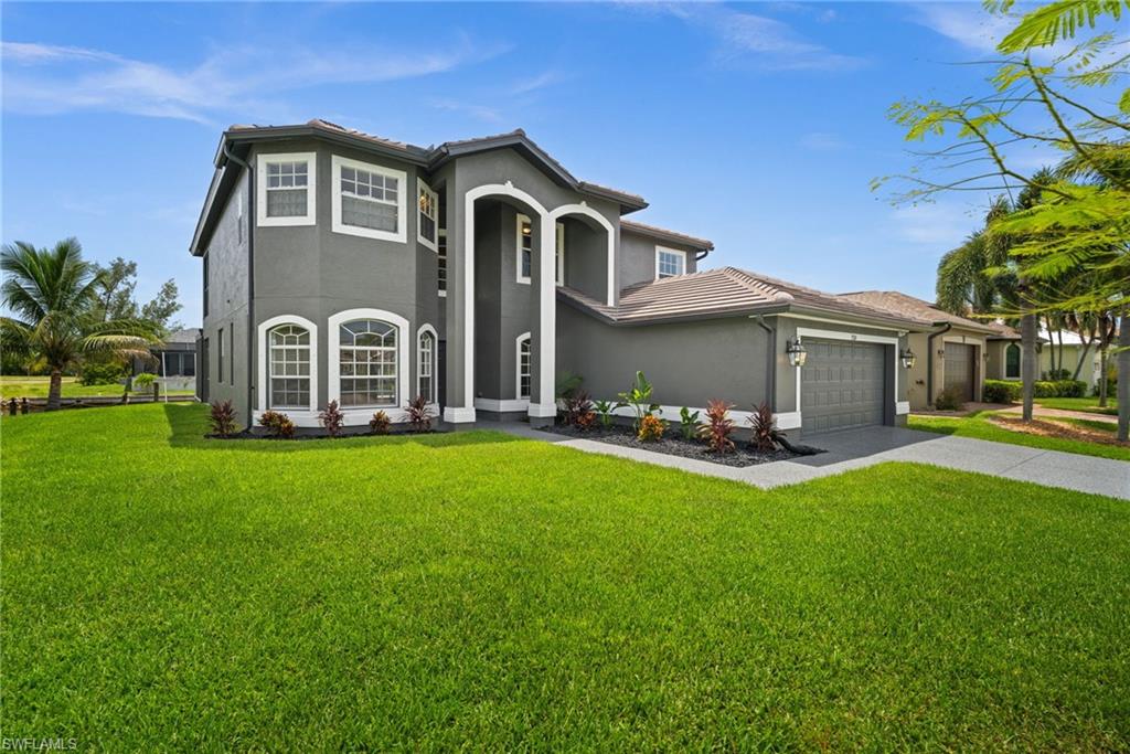 Corner exterior view showcases the home's scale, charcoal-toned exterior, tiled roofline, wide lawn, and landscaped beds. Documented exterior improvements include paint, high-durability surface coatings, turf work, and refreshed landscaping.