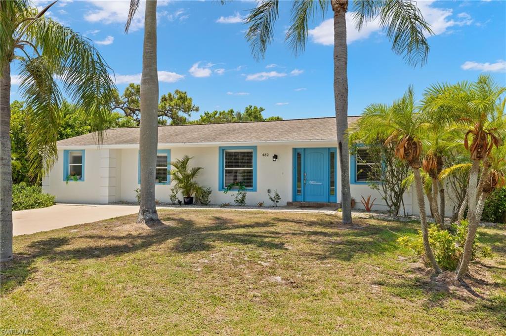 Single story home featuring a front yard