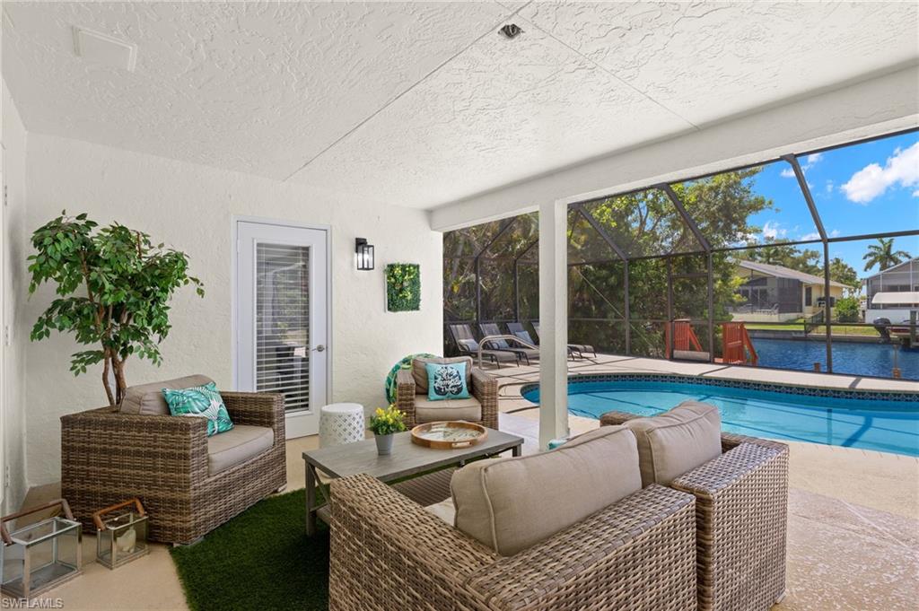 View of pool with a water view