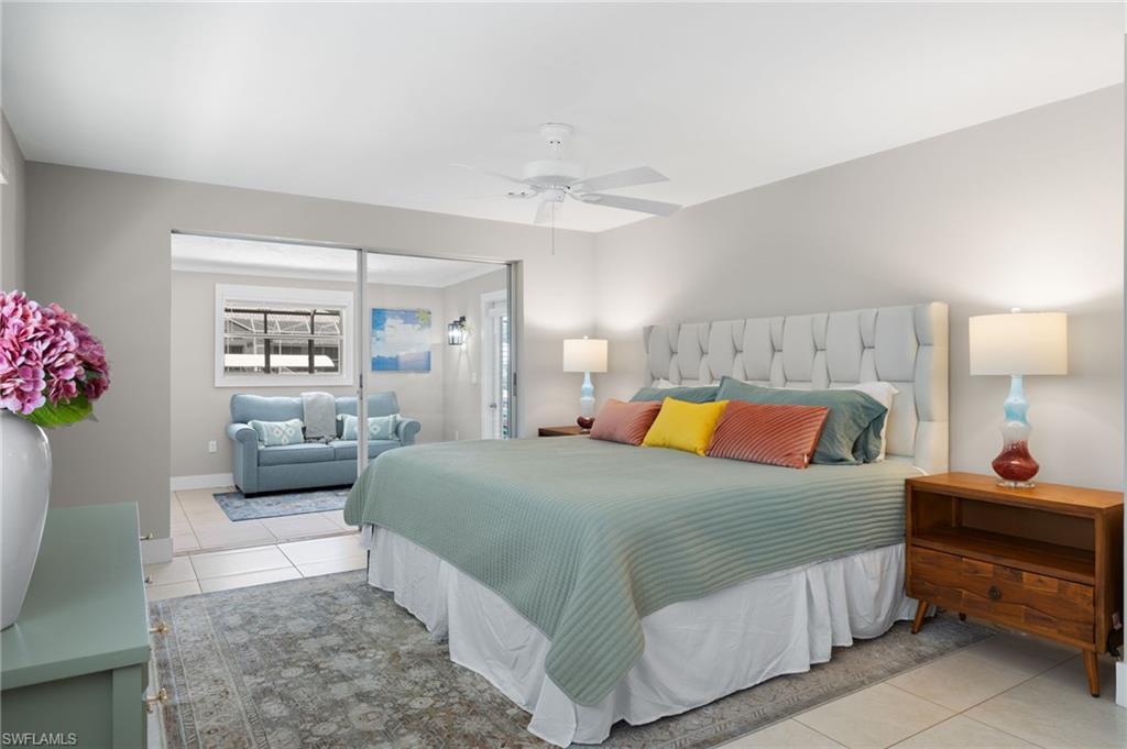 Tiled bedroom with ceiling fan
