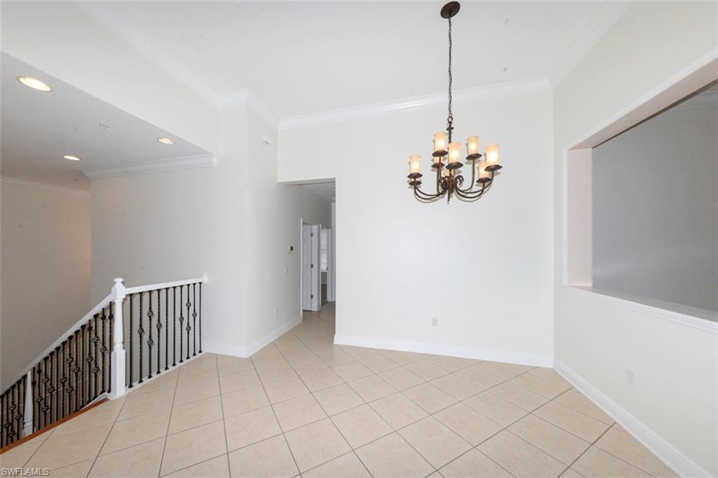 Dining room with Den to right. Looking toward hallway to Guest bedrooms and laundry.