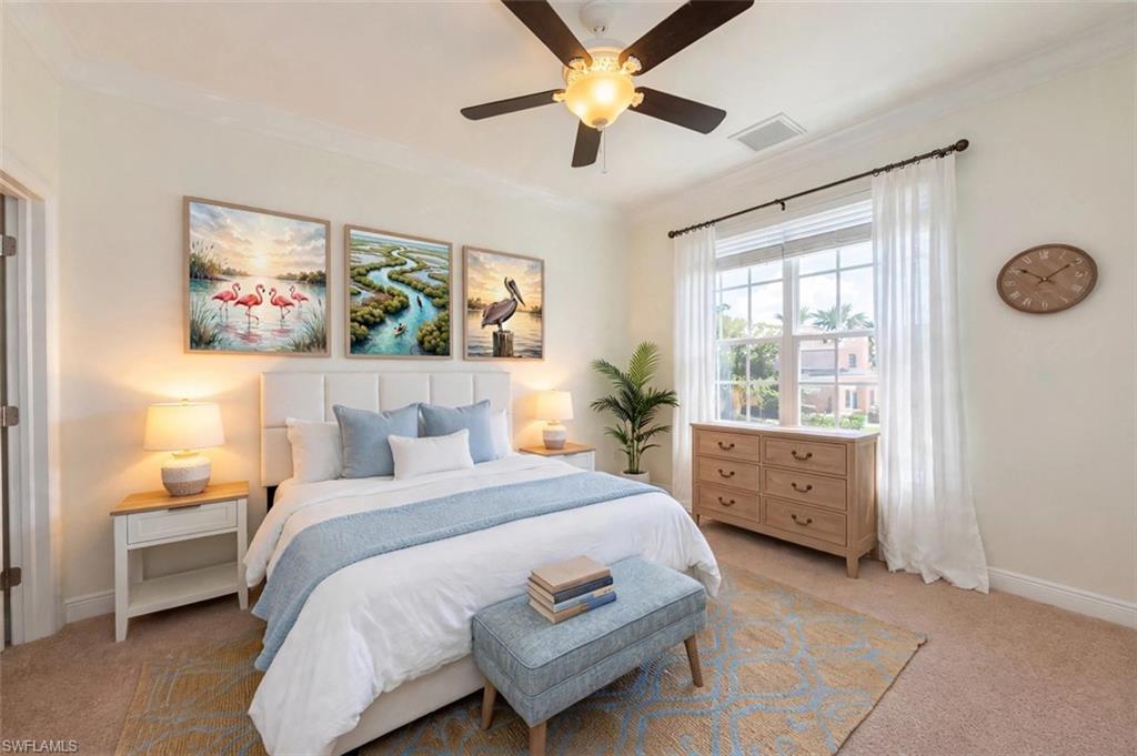 Large Guest bedroom with spacious walk-in closet and large window offering lots of natural light. Virtually staged.