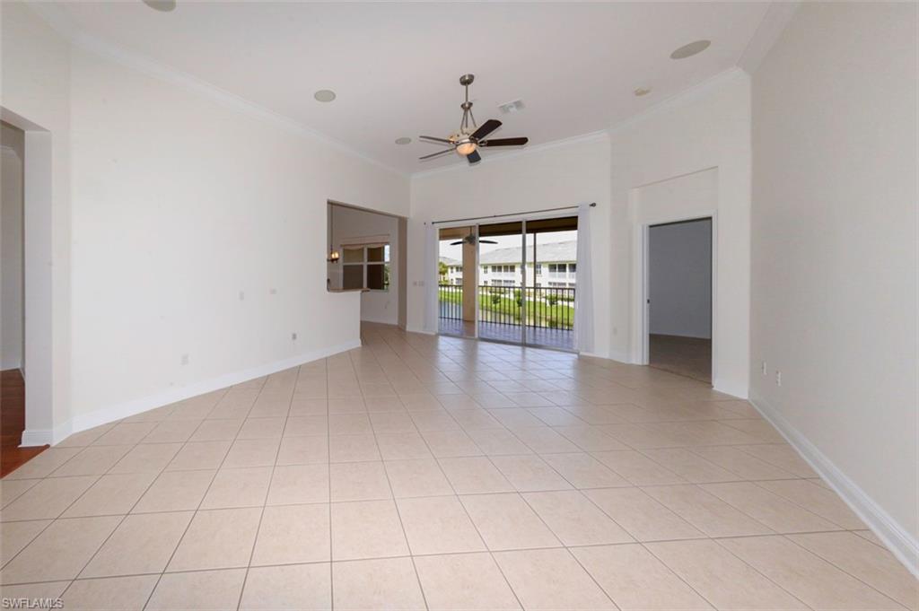 Great room looking toward large Lanai with Lake view