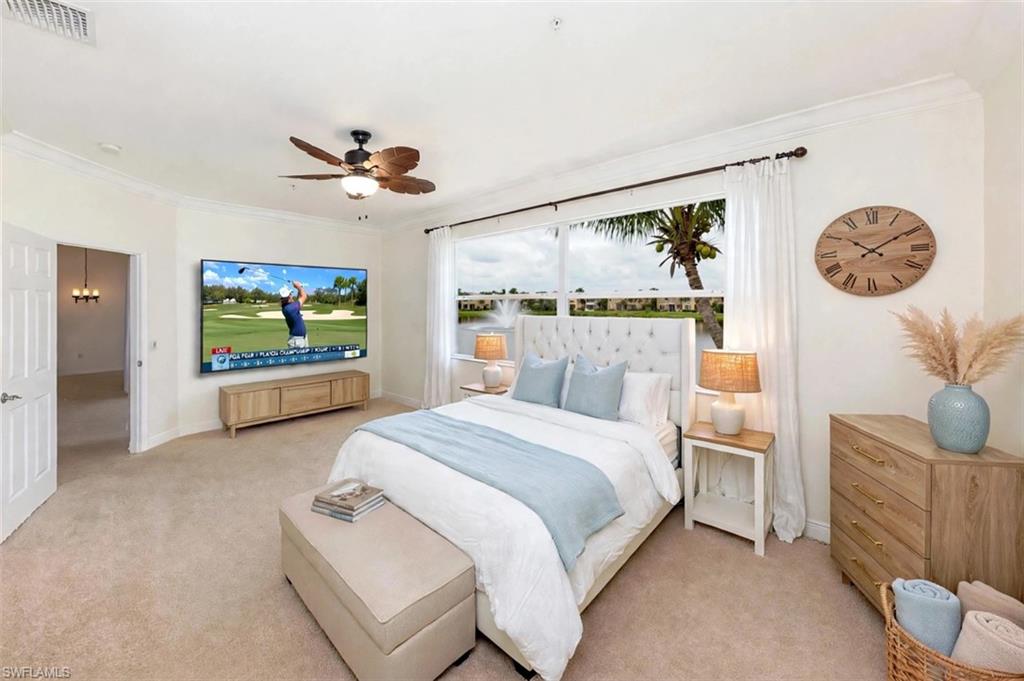 Primary Suite virtually staged. Shows Lake view from large windows