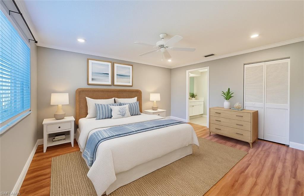 Master VIRTUALLY STAGED Bedroom with baseboards, light wood-type flooring, crown molding, recessed lighting, and multiple windows