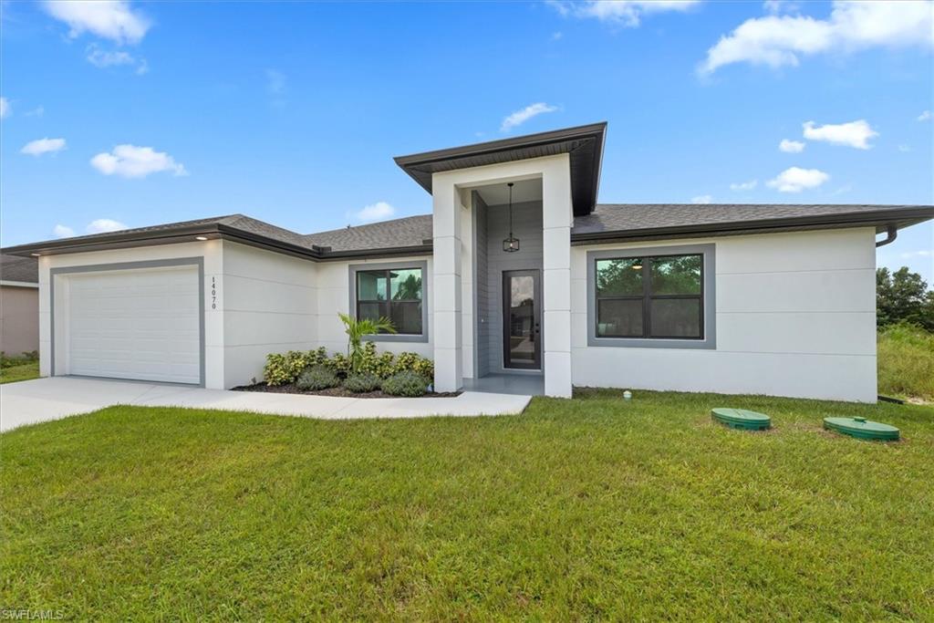 Nicely landscaped front area with auto sprinklers throughout the home including the front landscaping area.