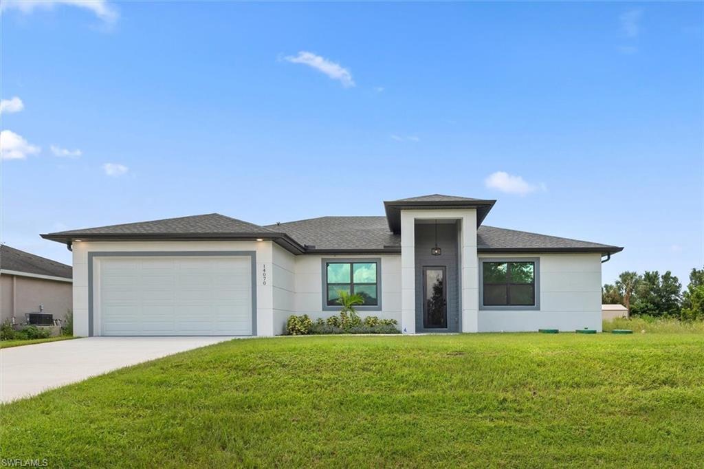 The home offers an oversized garage door that has a 8 foot height allowing more clearance. Recessed garage lights with a hanging light at the front entry. Hip roof design which slops to all sides gives you a insurance discount.