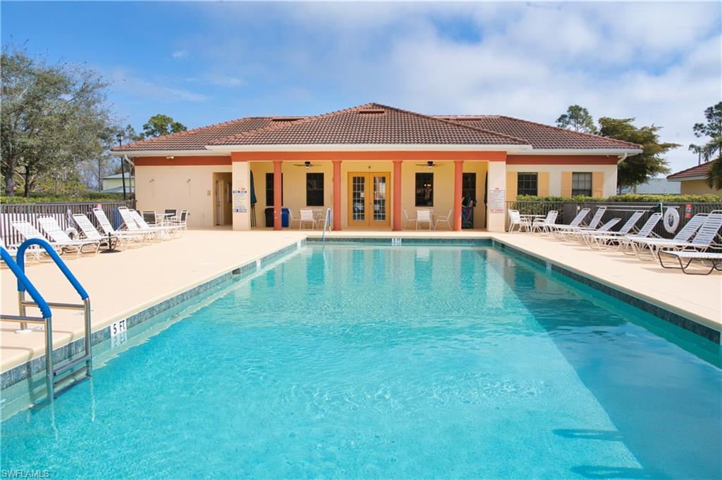 Outdoor swimming pool with integrated entry steps and a surrounding sun deck