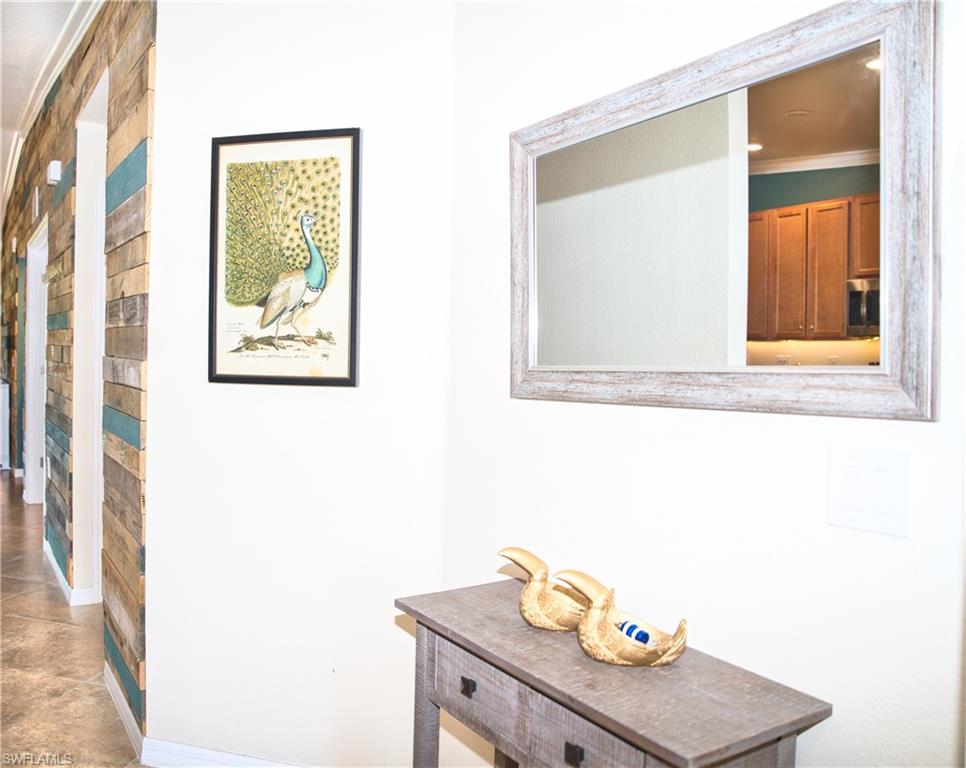 Hallway with wood-finish accent wall