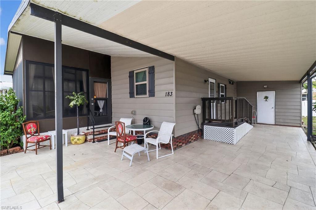 Expansive covered patio featuring stamped concrete flooring