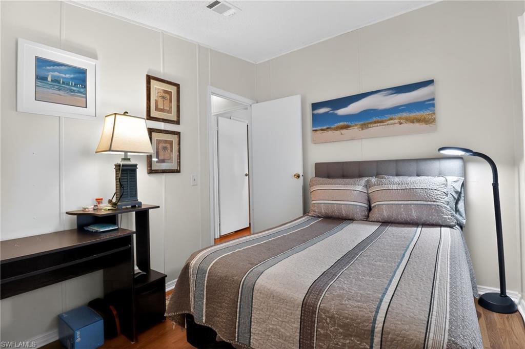 Hardwood-style flooring throughout
