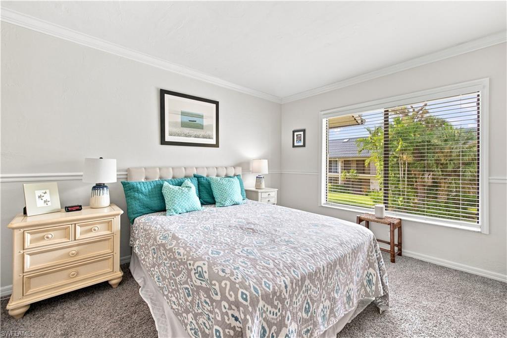 Wall-to-wall carpeting and crown molding