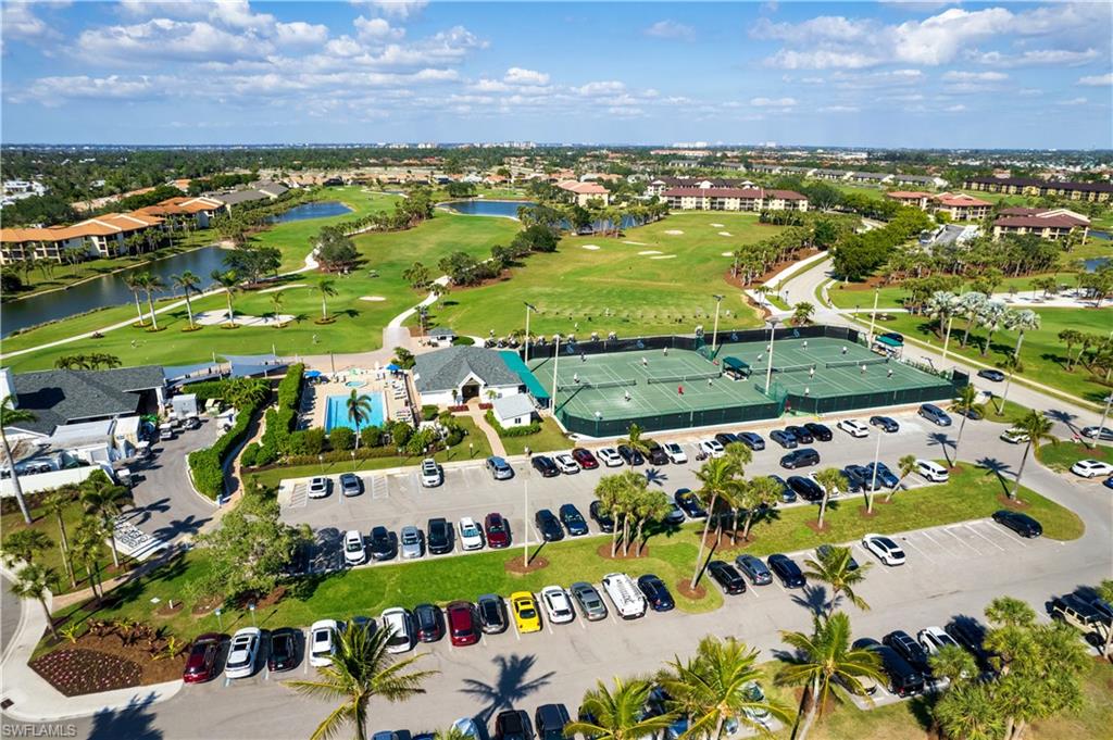 Expansive golf course with multiple greens and water features